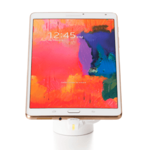 Tablet branco em um suporte de segurança branco